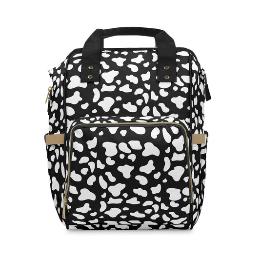 Black backpack with white cow print reverse cow print all over pattern