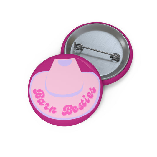 Hot pink button pin with light pink cowboy hat with The words barn Besties on the rim