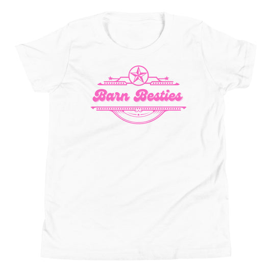 White tee with the words barn besties on the front and hot pink with the western border around the words